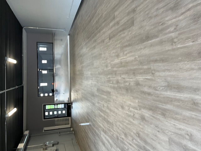 Modern hardwood floor installation in living room