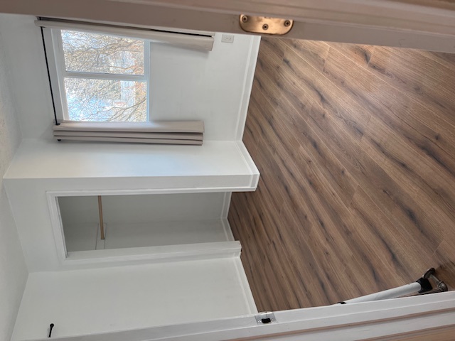Modern hardwood floor installation in living room