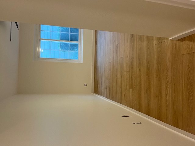 Modern hardwood floor installation in living room